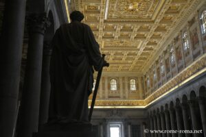 Statue and nave of Saint Paul outside the walls